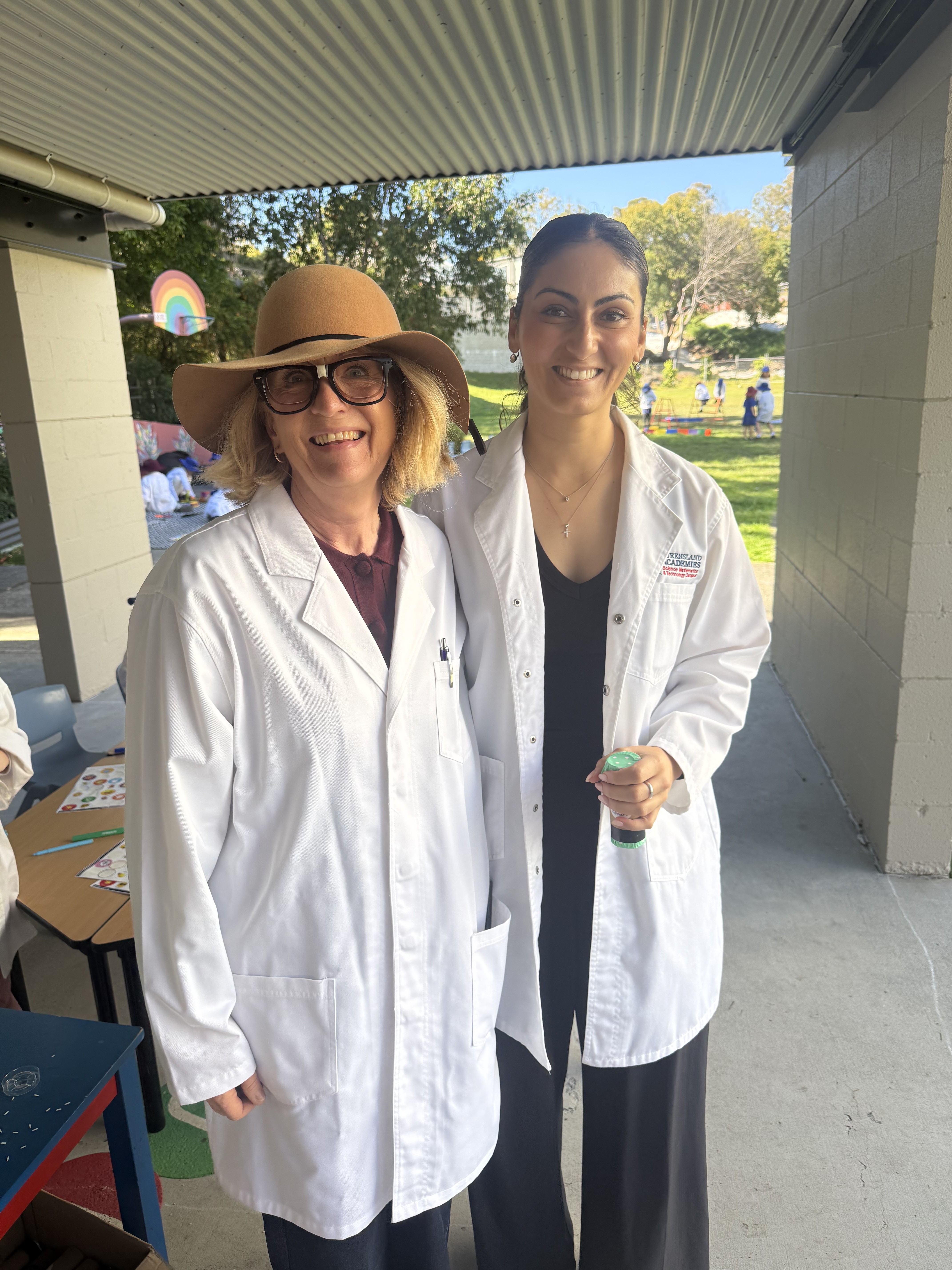 Teachers in lab coats