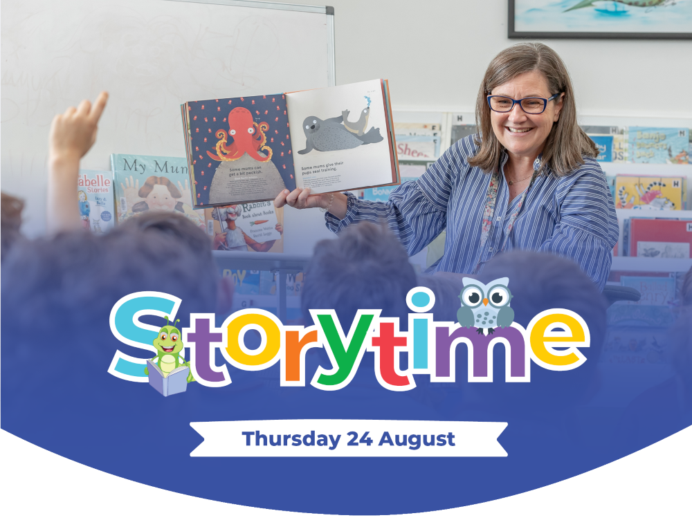 Teacher reading a picture book to young students during a Storytime session, promoting early literacy, listening skills and engagement with reading